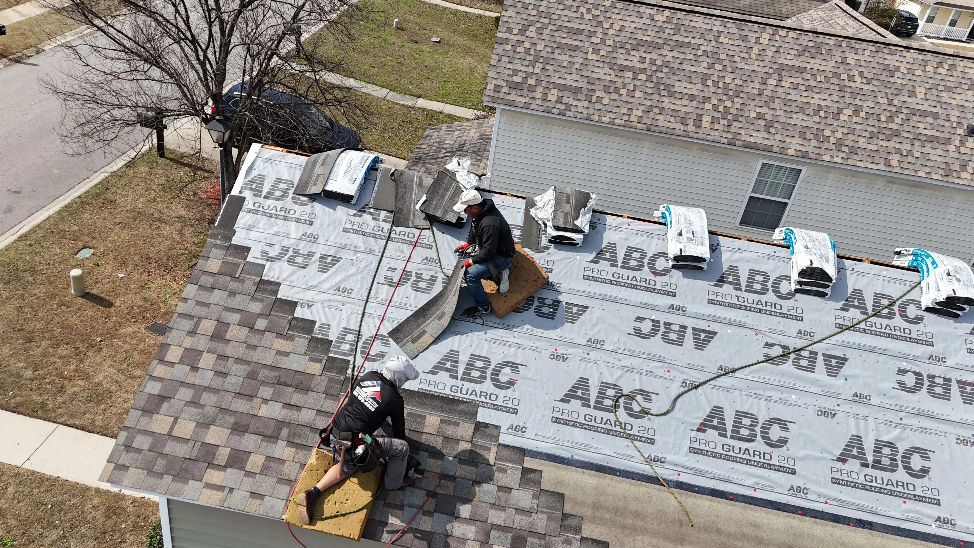 Professional roofer installing residential metal roofing on a home in Columbia SC